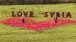 Caroline Cleave and Franca Westaway, Have a Heart for Syria (2013), 2000+ red fabric flags and supports