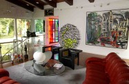 Back sitting room at ‘Bleep’, Eric & Jean Cass’s spectacular modernist Surrey home. Image shows a work by Dutch artist Karel Appel ‘The City’ which will now be on display at National Museum Cardiff. Photo: Douglas Atfield