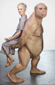 Patricia Piccinini, The Carrier (2012) , Fibreglass, silicone, human hair, clothing 170 x 115 x 75 cm © Patricia Piccinini