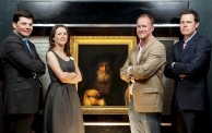 Staff at Woburn pose with the newly authenticated Rembrandt painting