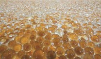 Mona Hatoum, Turbulence (detail), 2012, clear glass marbles, 4x400x400cm Photo Stefan Rohner. Courtesy Kunstmuseum St. Gallen© Mona Hatoum
