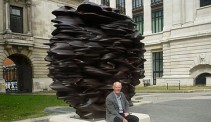 Tony Cragg with one of his works, at Exhibition Road, London