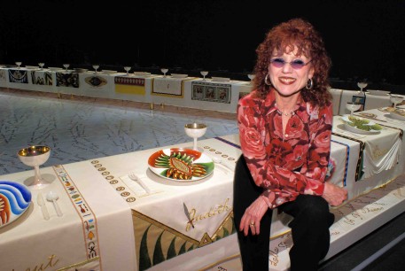 Judy Chicago with her work, The Dinner Party, at New York's Brooklyn Museum