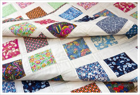 Quilt showing an array of Liberty fabrics. Photo courtesy Twistedthread.com