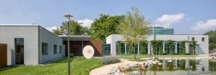 The building complex, set in a park, designed by Munich-based architect Dr Marie Aigner in collaboration with René Brogli (Bromer Architects)